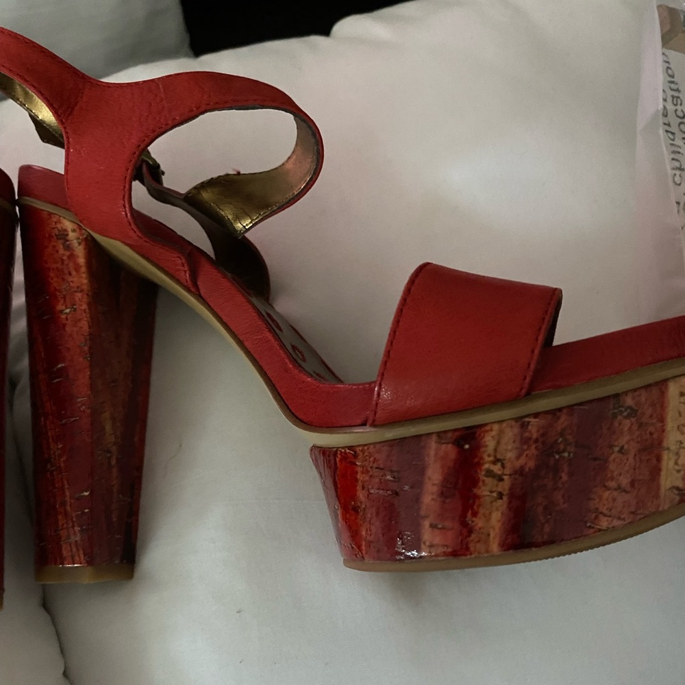 Never before worn red block heels.